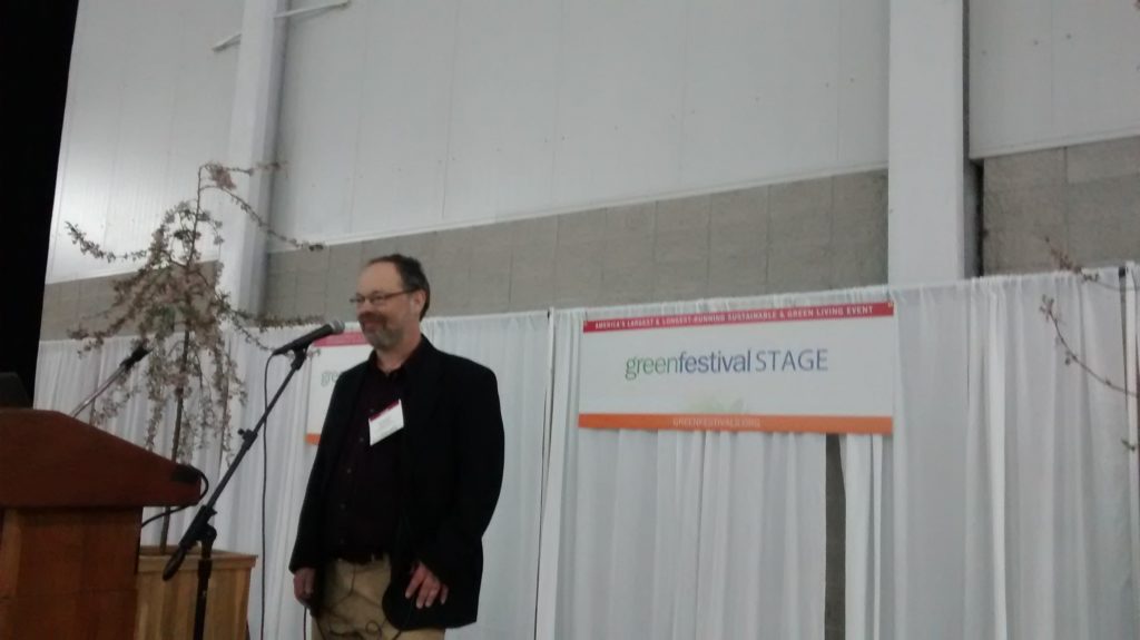 Shel Horowitz giving a Mainstage presentation at NYC Green Festival. Photo credit: D. Dina Friedman